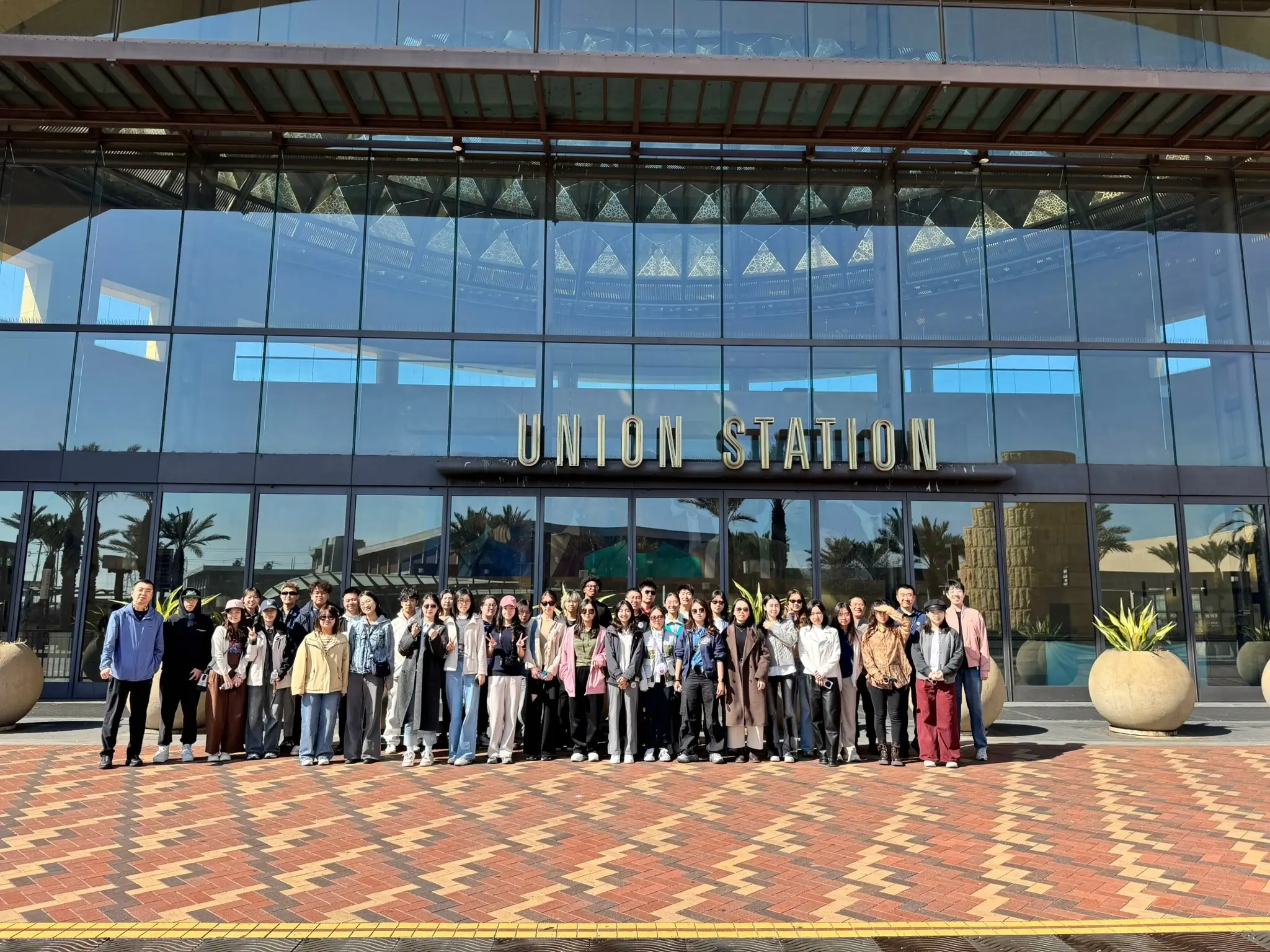 Large student group stands outside Union Station during an ERDT enVision Los Angeles educational trip
