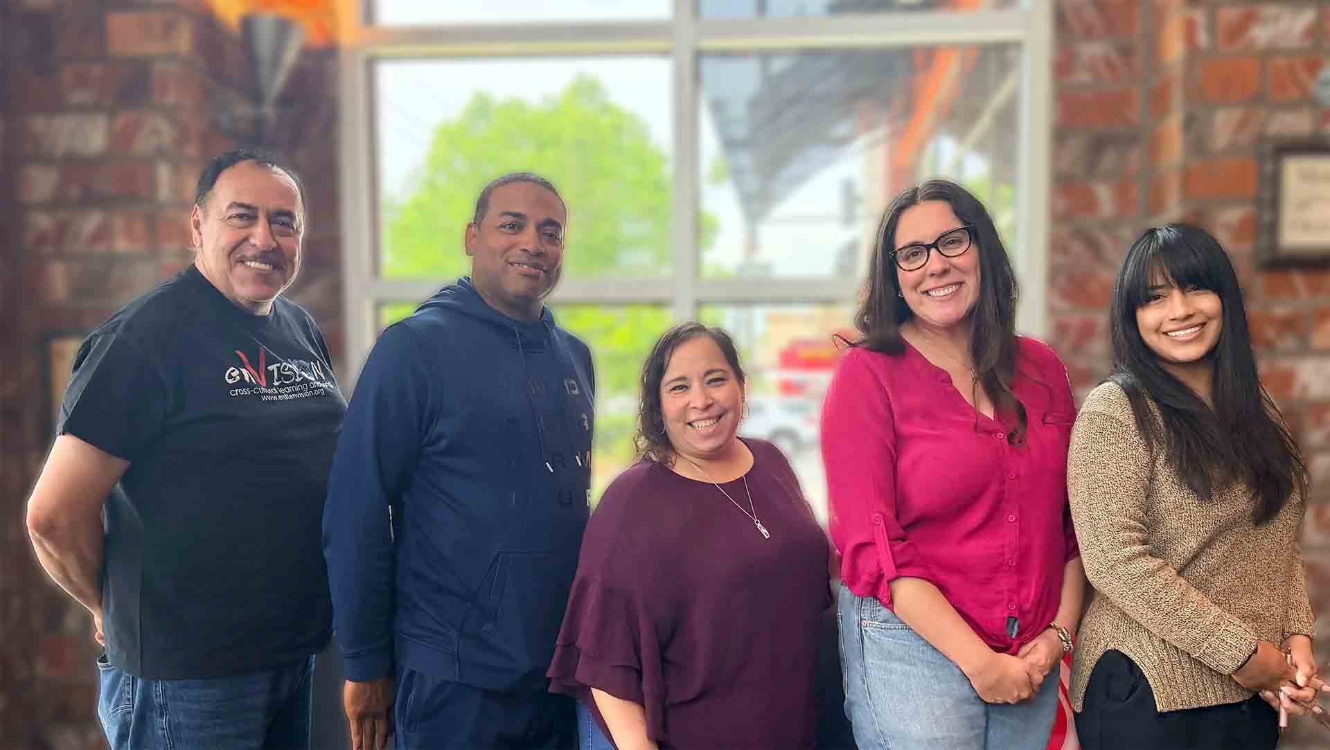 ERDT enVision team members and international student gather indoors during a cultural exchange workshop